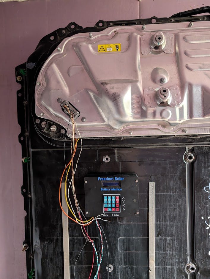 Freedom Battery Interface controller mounted on a Tesla battery pack