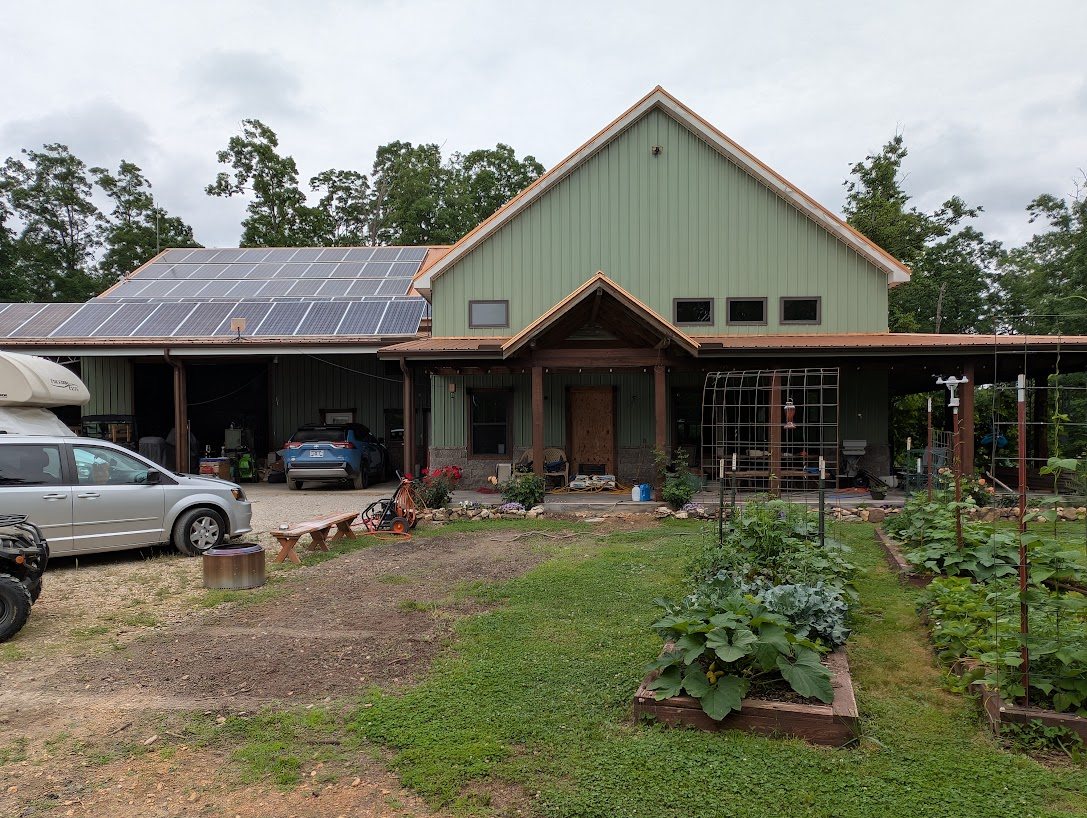Homestead with solar roof and garden